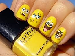 Smiley Nail art design yellow